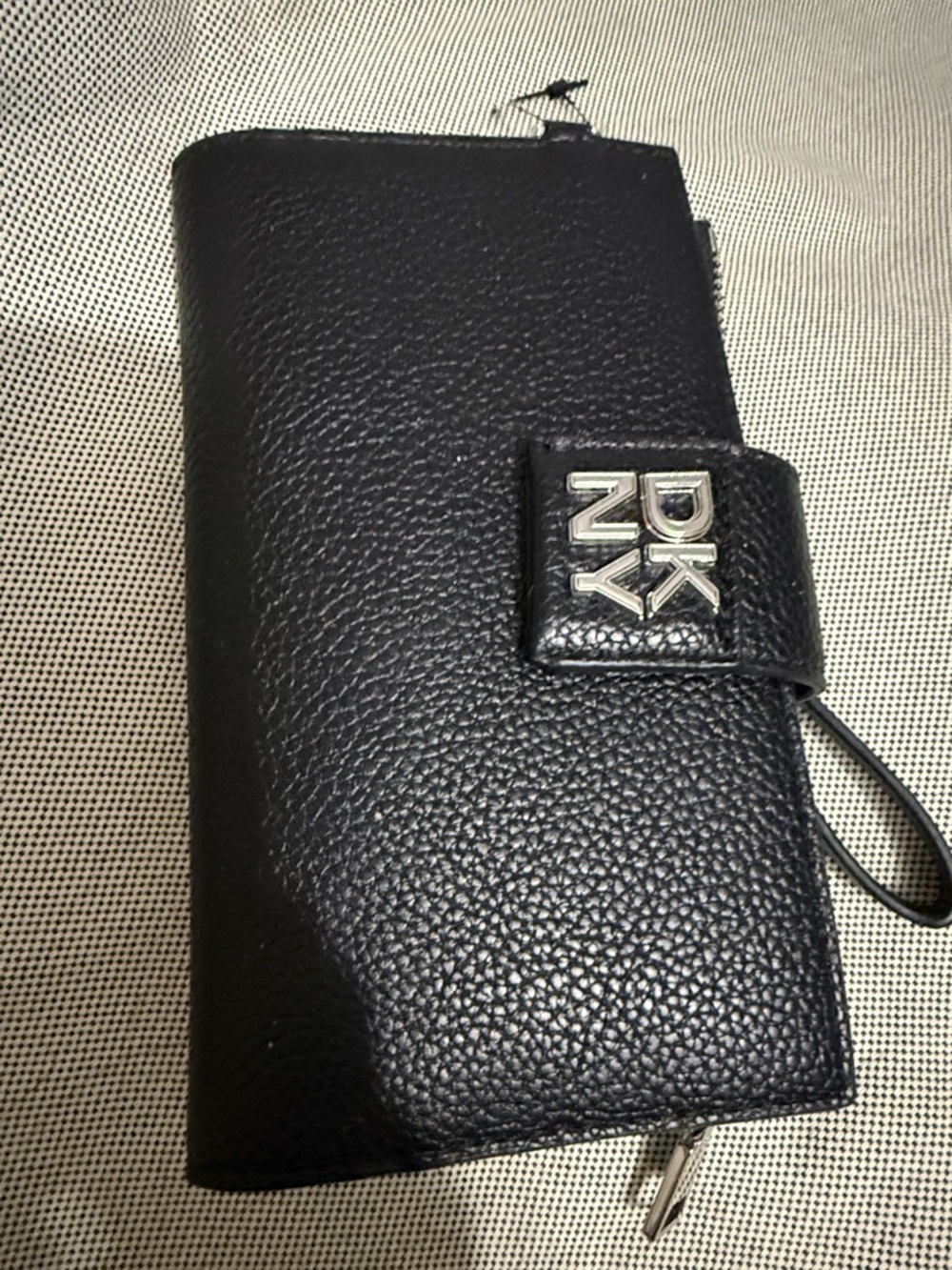 DKNY Black Pebbled Leather Zip Wristlet with Logo Snap Closure